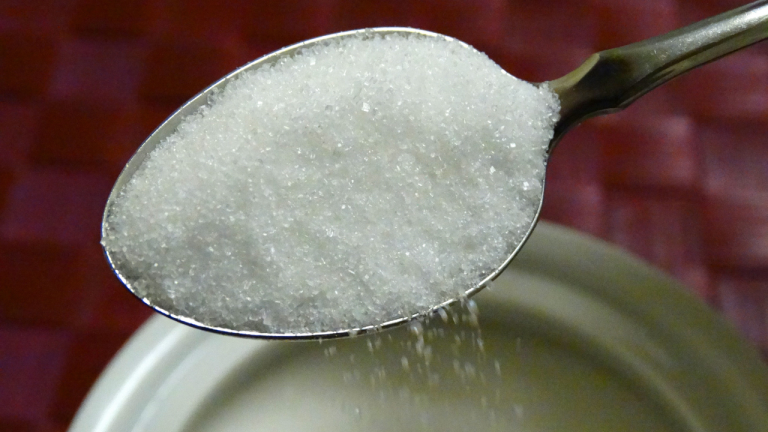 What are the Pros and Cons of Consuming Sugar in a Large Amount?